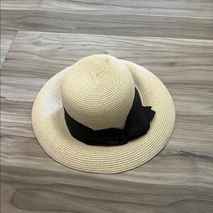 Elegant Straw Hat with Black Ribbon
